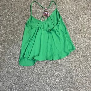 Green tank top with nice back design.